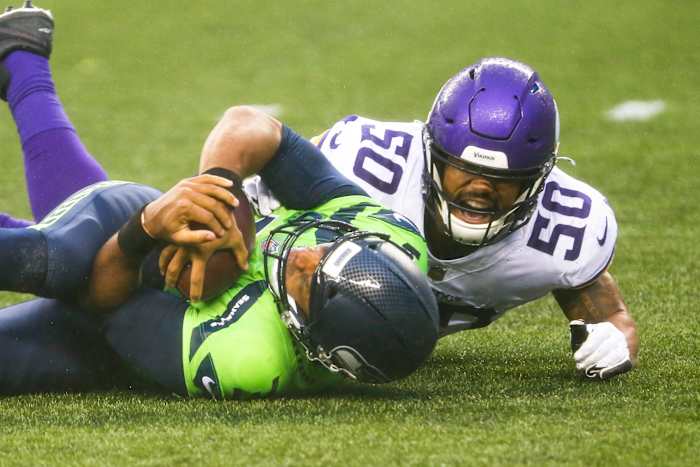 Vikings outside linebacker Eric Wilson sacks Seahawks quarterback Russell Wilson during the second quarter.